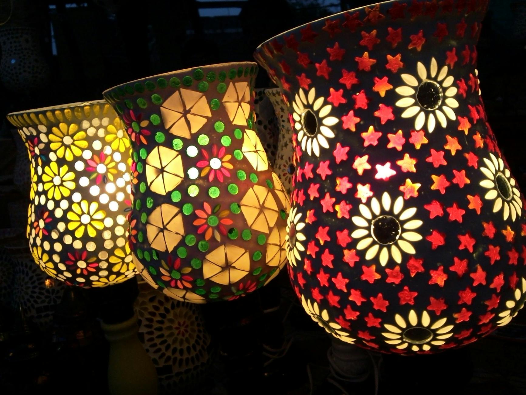 three assorted color floral projection lamps